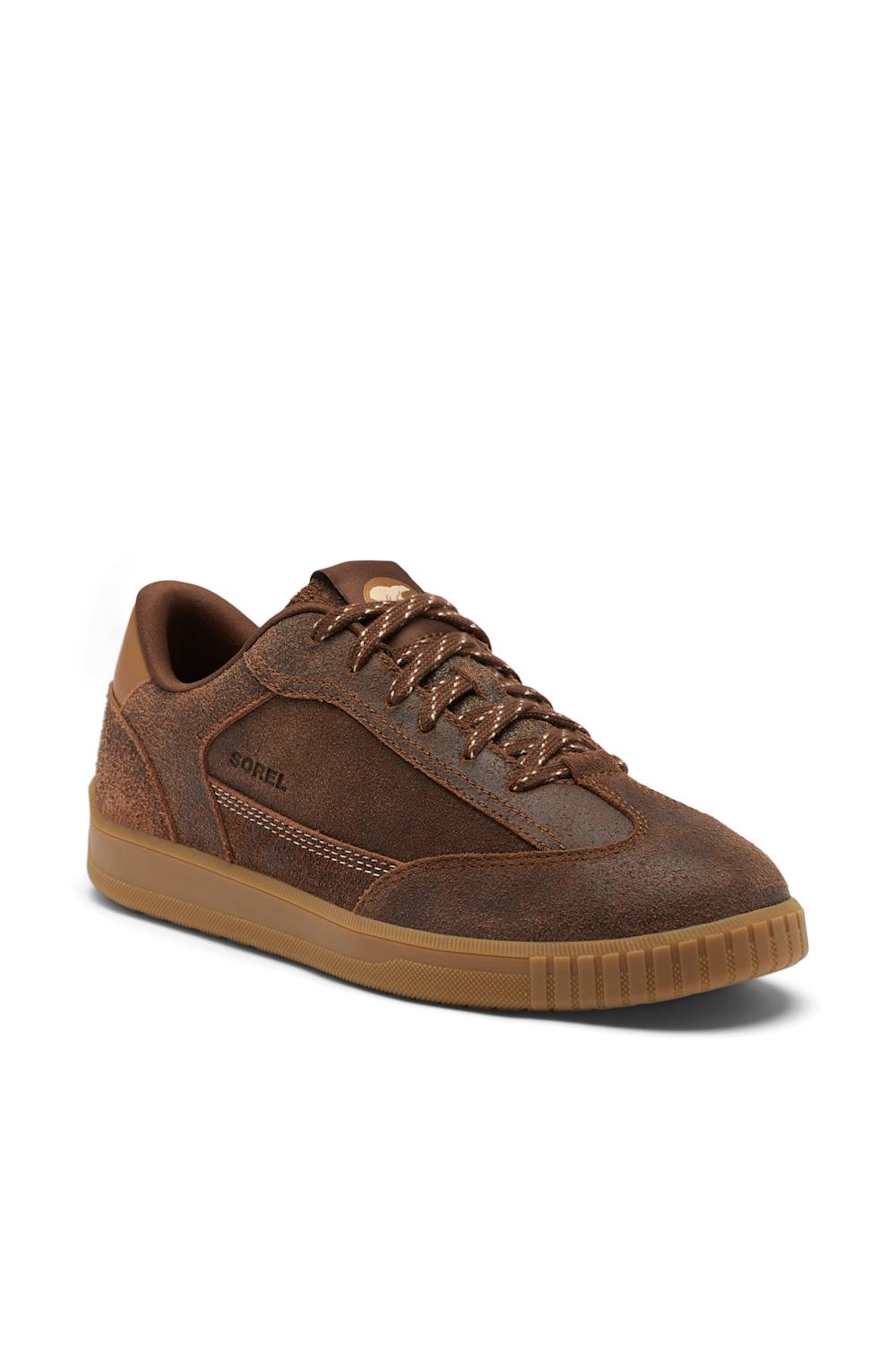 A brown suede and leather low-top sneaker with matching brown laces and a tan rubber sole, shown from a three-quarters angle on a white background.