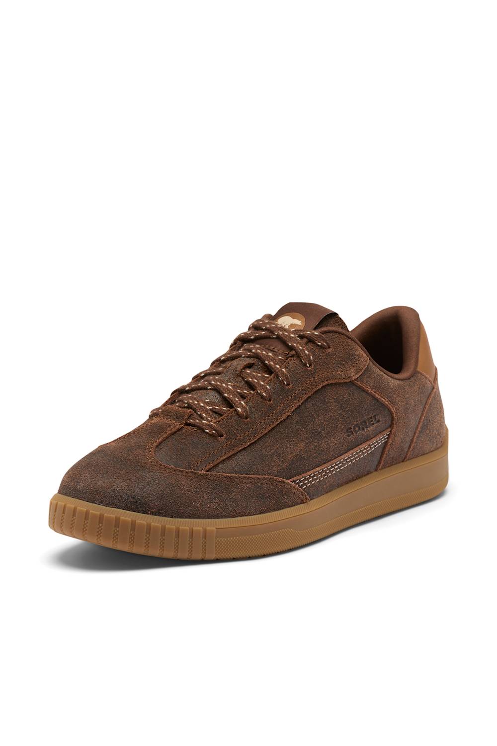 A brown suede low-top sneaker with matching brown laces and a gum rubber sole, shown from a three-quarters angle on a white background.