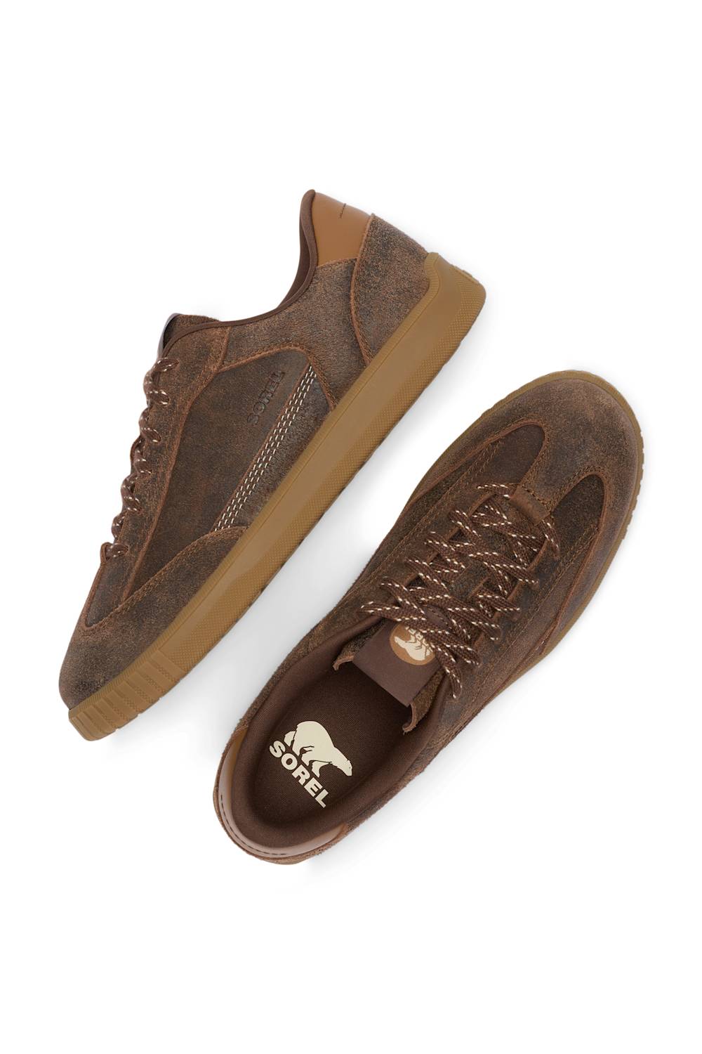 A pair of brown suede and leather low-top sneakers by Scapelli, featuring a gum sole and the brand name printed on the insole.