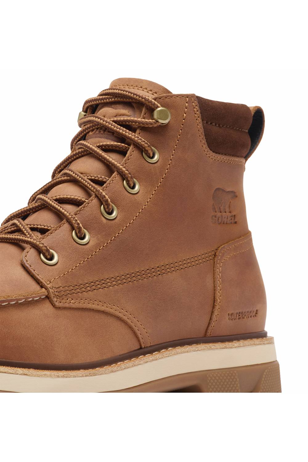 A close-up of a brown suede and leather work boot with tan laces, brass eyelets, and a beige and brown sole, featuring the Sorensen bear logo on the side.