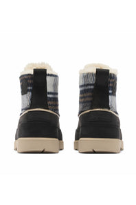 A pair of women's mid-calf winter boots shown from the back, featuring a black suede-like lower section, a plaid patterned upper with cream shearling lining, and beige soles.