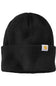 A black waffle-knit beanie hat with a folded cuff and a small white Carhartt logo patch on the side, shown against a plain white background.
