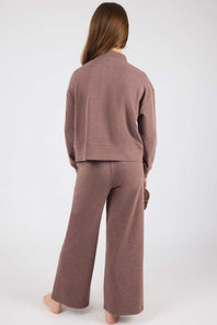 back view of girl modeling a brown matching set 