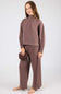girl modeling a brown matching set 