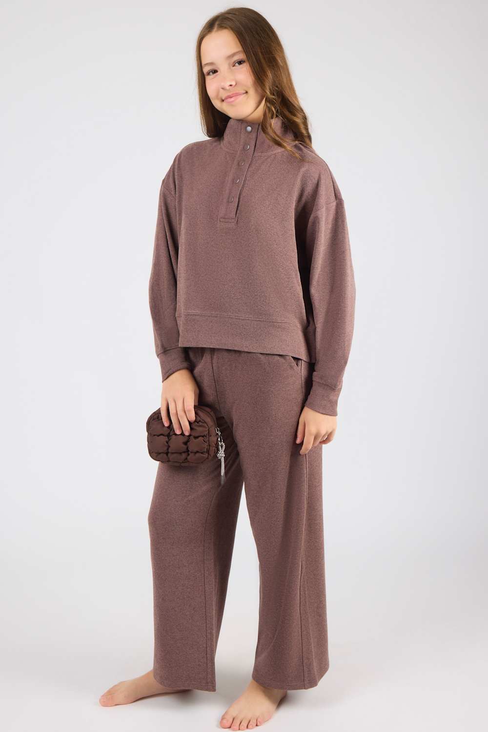 girl modeling a brown matching set 