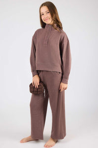 girl modeling a brown matching set 
