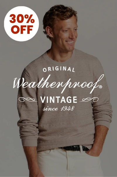 Promotional graphic with a man wearing a tan crewneck sweater in front of a basic background with an image overlay darkening the image. The Weatherproof Vintage logo in white is in the center of the image and a circular callout in the upper left corner that reads 30% OFF
