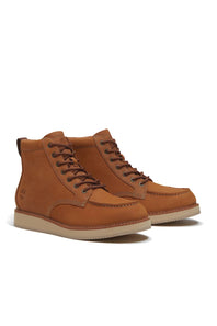 A pair of men's mid-calf lace-up boots in tan suede, featuring dark brown laces and a light beige outsole, shown against a plain white background.