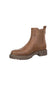 A brown leather Chelsea boot with a round toe and a thick, low stacked lug sole, shown from a side profile on a white background.