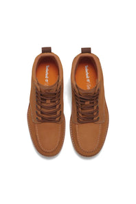 A pair of Timberland lace-up ankle boots in a warm tan-brown leather, shown from a top-down view on a white background.