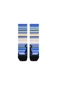 A pair of crew socks with horizontal stripes in blue, navy, beige, and white, featuring a black anchor graphic and the Stance brand logo on the toes.