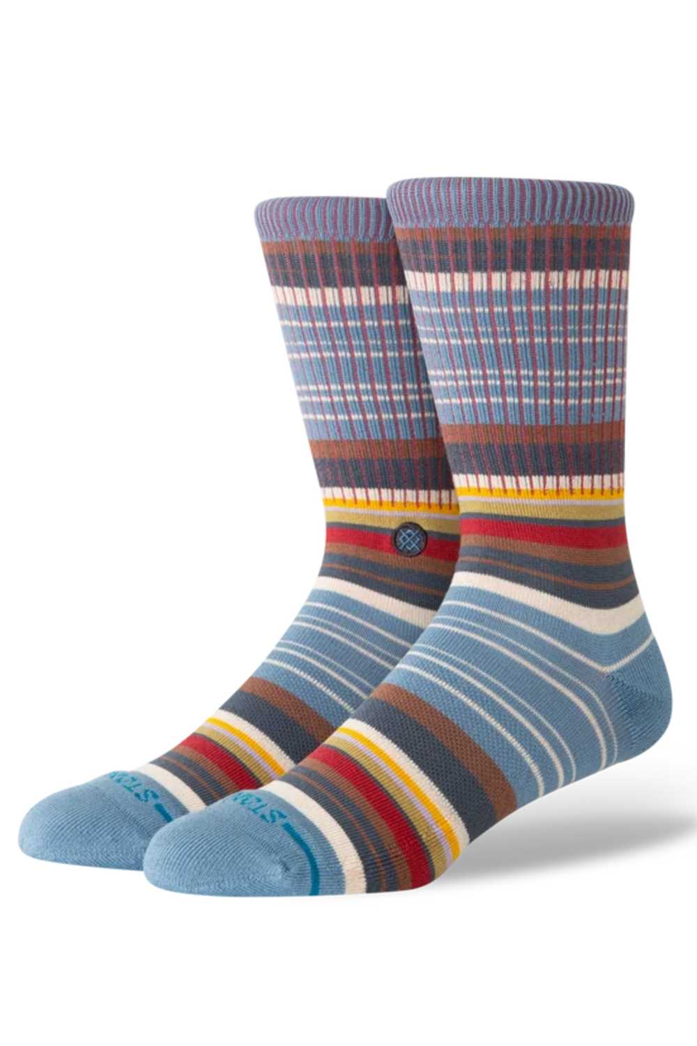 A pair of crew socks with a multicolor striped pattern featuring blue, purple, brown, red, yellow, and white horizontal bands, displayed on a clean white background.