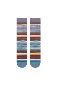 A pair of crew socks with a multicolor striped pattern featuring shades of blue, gray, red, yellow, and white, displayed flat against a solid white background.