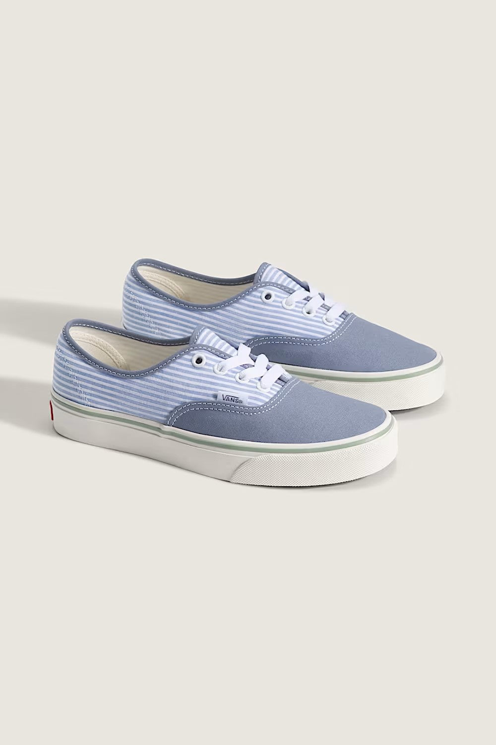 Vans Authentic Sneakers for Women in Stripes/Glacial Slate; Pair of blue striped sneakers on a light gray background