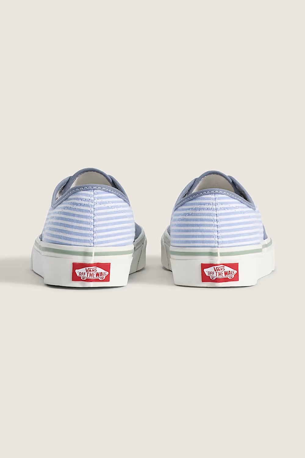Vans Authentic Sneakers for Women in Stripes/Glacial Slate; Pair of blue striped sneakers on a light gray background