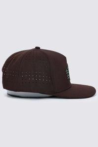 Brown corduroy cap on a white background