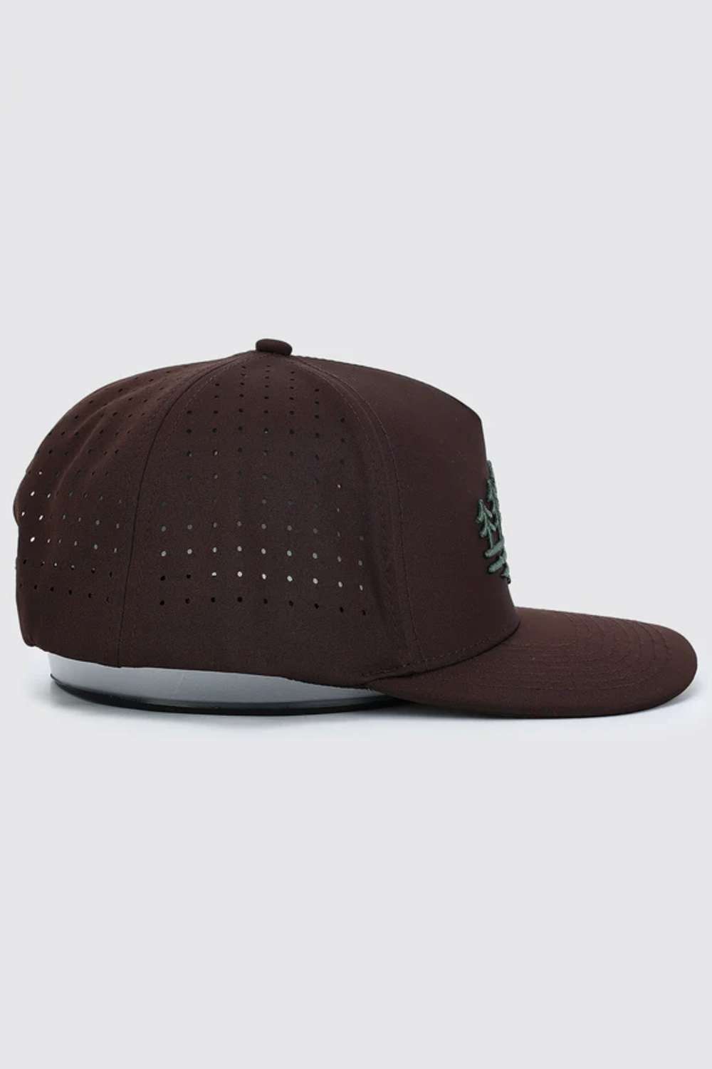 Brown corduroy cap on a white background