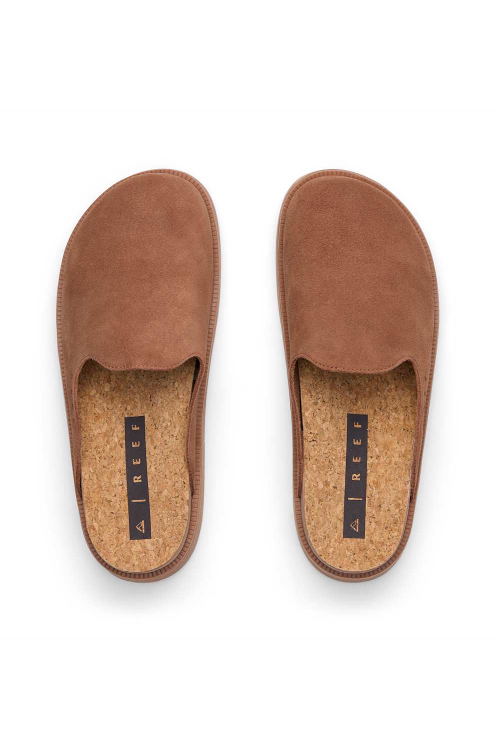 A pair of brown slip-on clogs with a suede-like upper and a natural cork insole, shown from a top-down view on a white background. The brand name '4 REEF' is printed vertically on a black label on the insole.