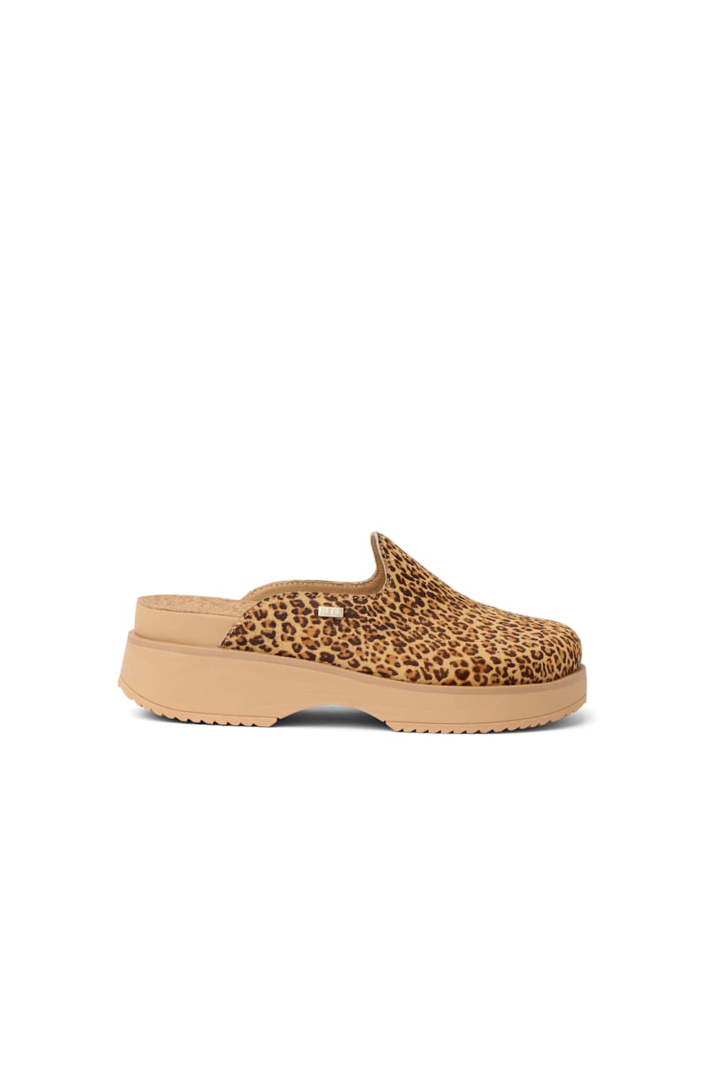A single slip-on clog shoe with a tan and brown leopard print upper and a tan sole, shown from a side profile on a white background.