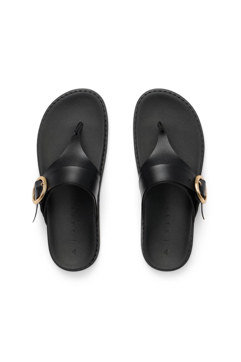 Pair of black sandals with gold accents on a white background