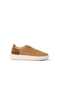 A low-top casual sneaker in tan suede and brown leather, featuring a thick off-white sole, shown from a side profile on a white background.