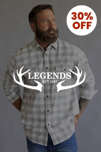 Promotional graphic with a man wearing a grey and white plaid flannel in front of a basic background with an image overlay darkening the image. The 1897 Legends logo in white is in the center of the image and a circular callout in the upper right corner that reads 30% OFF
