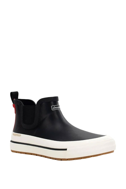 A black rubber Chelsea boot with a white platform sole and a small red accent on the heel, shown against a plain white background.