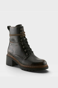 A black leather lace-up ankle boot with a chunky block heel, brown welt stitching, and a decorative brown strap detail near the collar, shown on a light gray background.