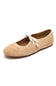 A light tan suede ballet flat shoe with a decorative braided rope bow on the strap, shown from a three-quarters angle on a white background.