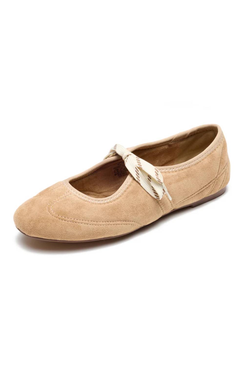 A light tan suede ballet flat shoe with a decorative braided rope bow on the strap, shown from a three-quarters angle on a white background.