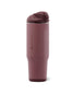 A HydroJug insulated travel tumbler in a dusty rose color, featuring a matching flip-top lid and a vertical brand logo on the front, set against a plain white background.