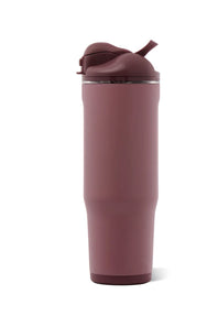A tall, matte mauve-pink insulated tumbler with a matching flip-top lid and straw, shown on a clean white background.