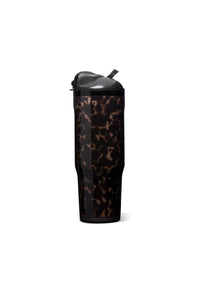 A tall travel tumbler with a black and brown tortoiseshell pattern, featuring a black lid with a straw, set against a plain white background.