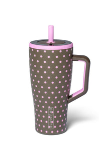 A tall insulated tumbler with a handle, featuring a dark brown body covered in pink polka dots, a pink lid and straw, and a dark brown handle with pink trim. The brand name 'BRUMATE' is printed vertically near the bottom.