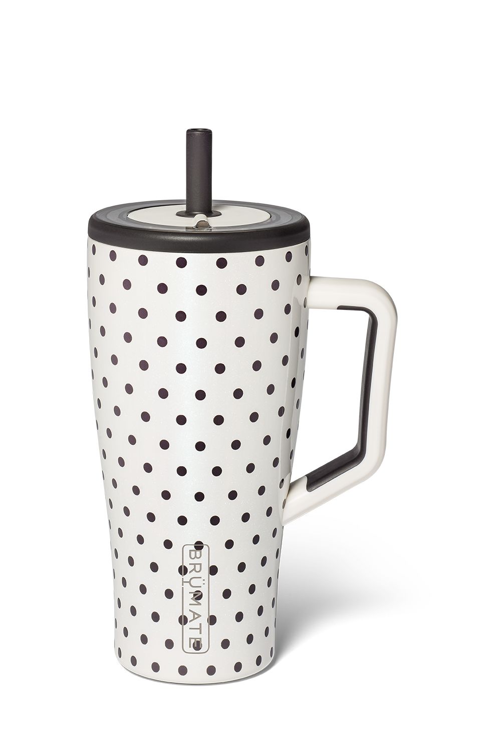 A white ceramic travel mug with black polka dots, a white handle, and a black lid with a black straw, shown on a white background.