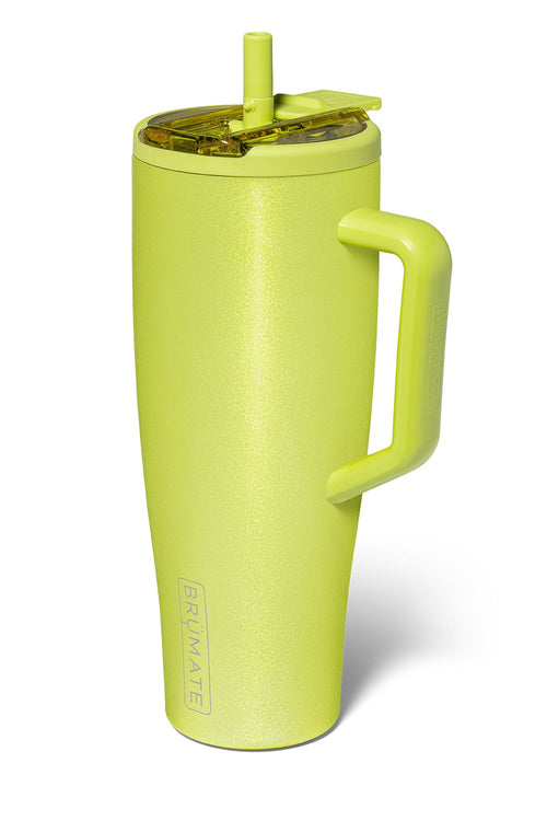 Neon yellow sparkly tumbler with a slide covered straw, with side handle and BruMate logo 