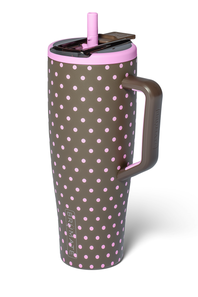 A tall insulated tumbler with a handle, featuring a dark brown body covered in pink polka dots, a pink lid, and a matching pink-and-brown straw, shown on a white background.