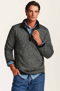 man wearing black sweater 