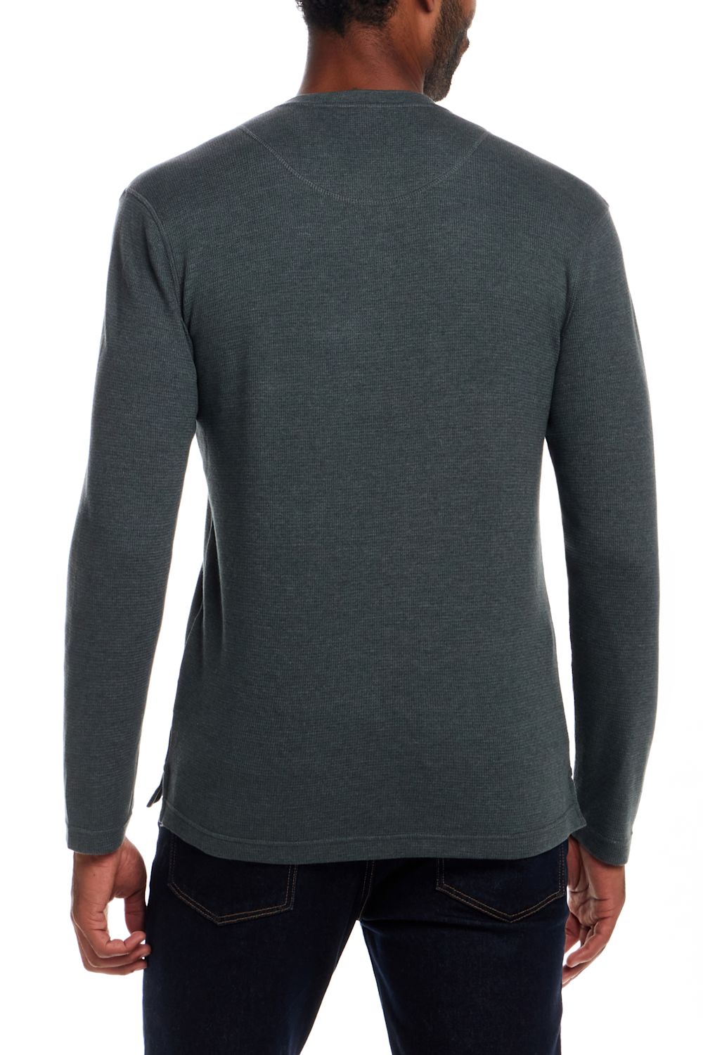 A man viewed from the back wearing a dark heather gray long-sleeve shirt and dark blue jeans against a plain white background.