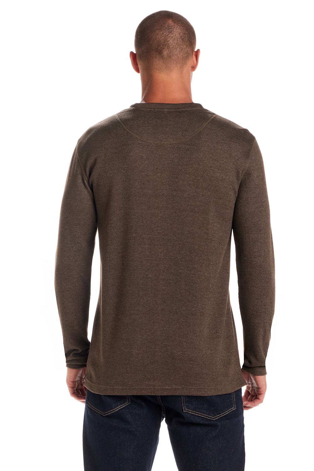 A man viewed from the back wearing a dark brown long-sleeve crewneck shirt and dark blue jeans against a white background.