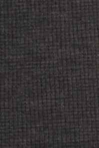 A close-up texture shot of a dark charcoal gray woven fabric with a fine grid-like pattern.