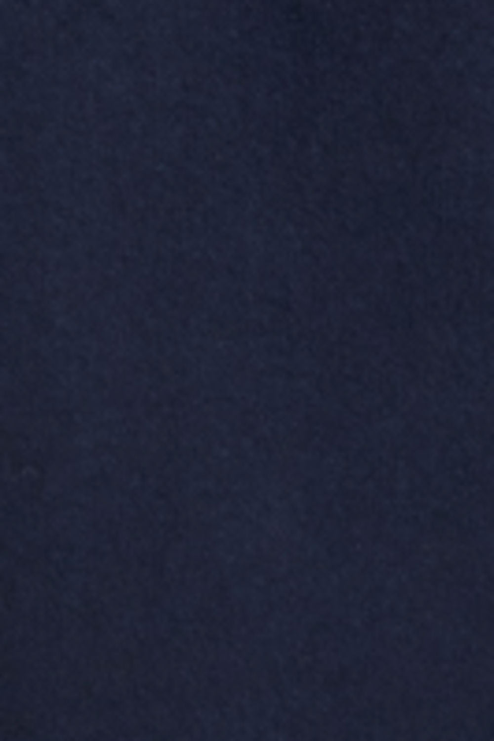 A close-up of a dark navy blue textured fabric surface.