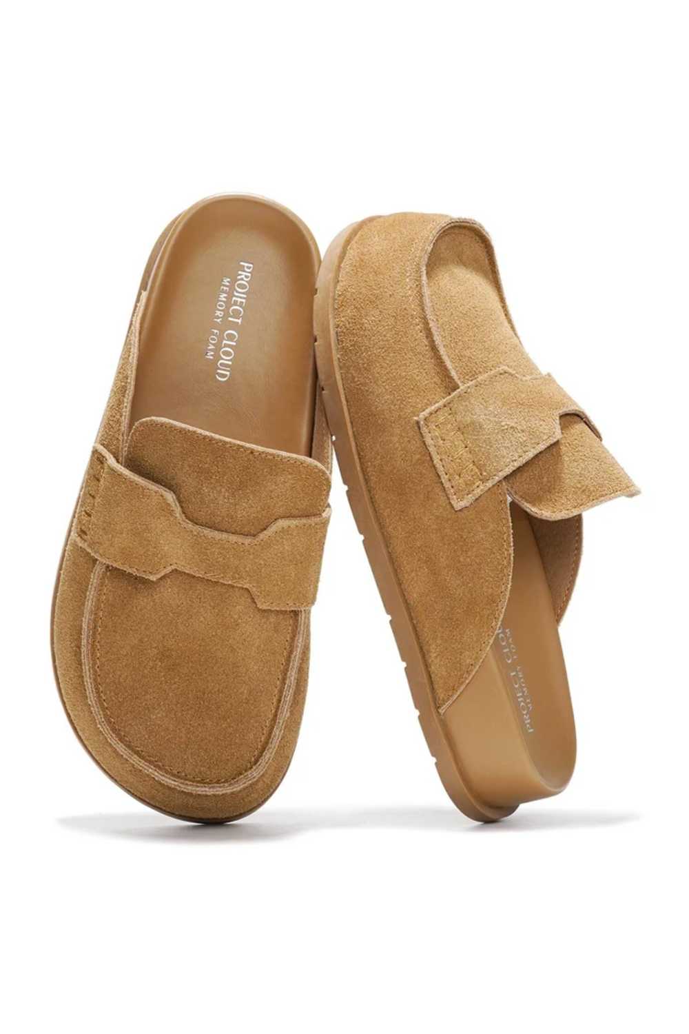 A pair of tan suede clogs with a strap detail across the top, displayed on a clean white background. The brand name 'project cloud' is visible on the insole.