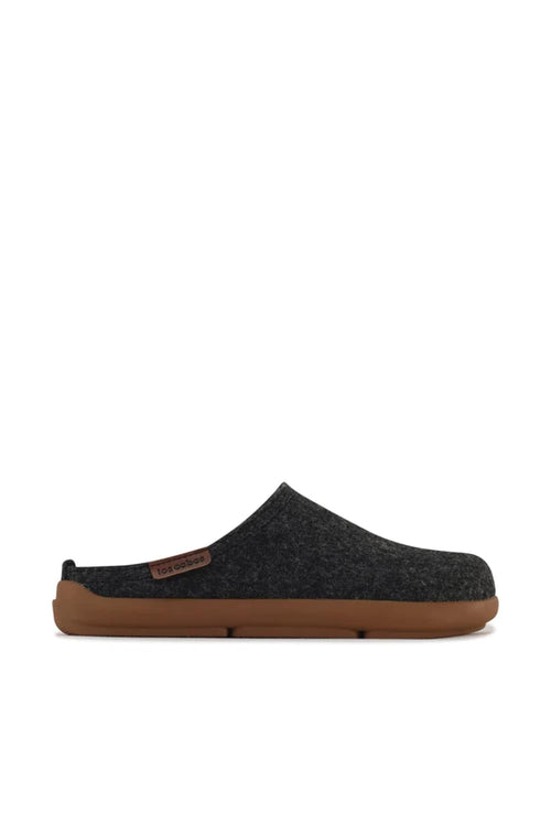 A single dark gray felt slip-on clog shoe with a brown rubber sole, shown in profile against a solid white background.