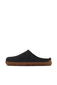 A single dark charcoal gray felt slip-on clog shoe with a brown rubber sole, shown in a side profile view against a solid white background.