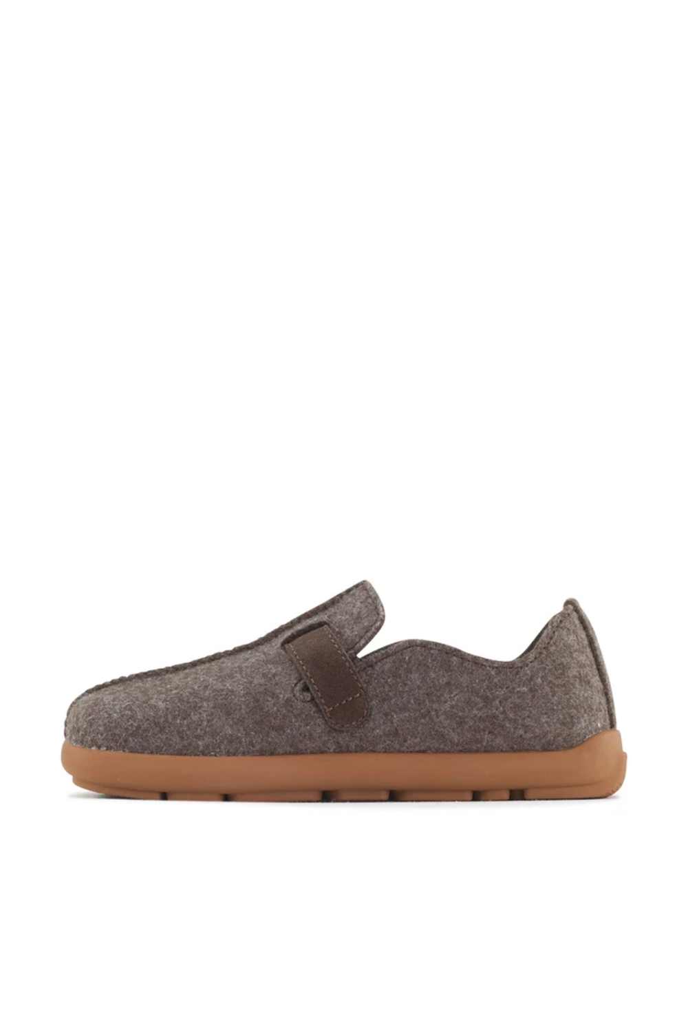 A single slip-on shoe in textured brown felt with a matching brown strap and a gum brown sole, shown in profile against a white background.