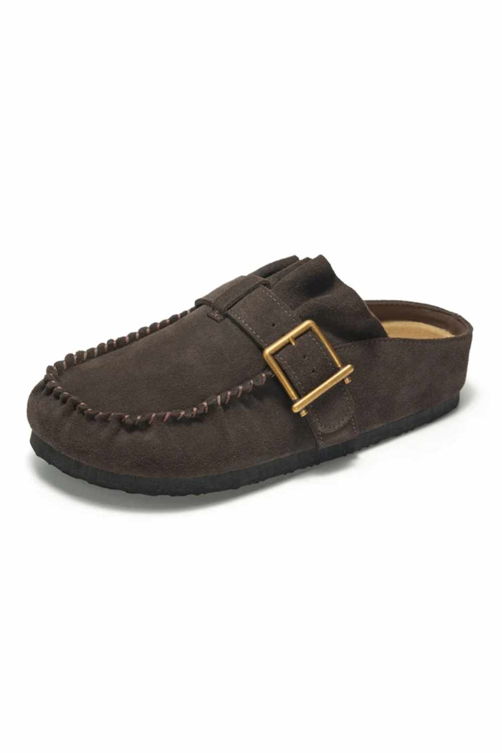 A dark brown suede moccasin-style clog shoe with a decorative strap and a gold-tone buckle, shown from a side angle on a white background.