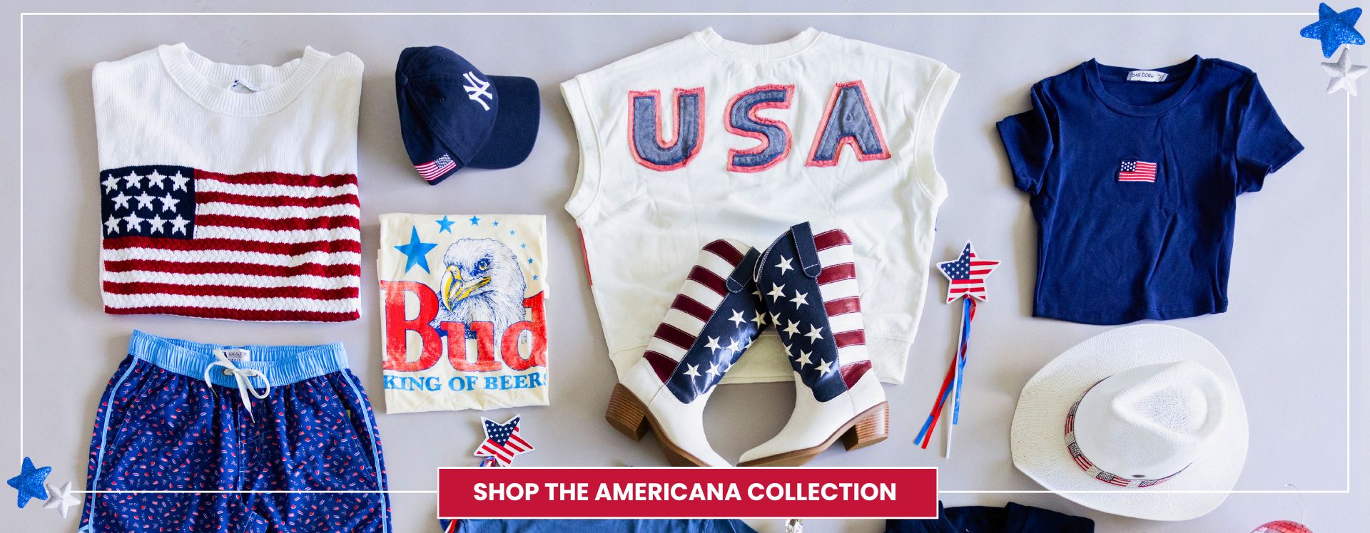 Different USA clothing, shoes, and accessories on a plain background with a white trim border, and a red box with text "Shop the Americana Collection"