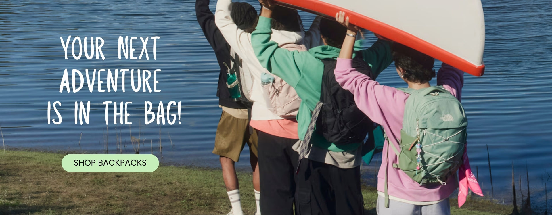 Promotional banner showing a group of people wearing backpacks and carrying a canoe beside a lake. The text reads, "Your Next Adventure Is in the Bag!" with a "Shop Backpacks" button.