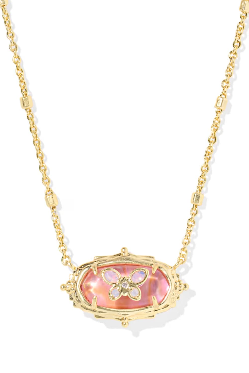 A gold chain necklace featuring an oval pendant with a pink iridescent mother-of-pearl inlay and a central gold flower motif with small clear stones, shown on a white background.